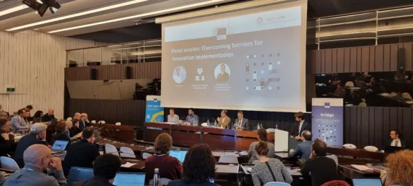 OMEGA X at BRIDGE: Presenting World Café main ideas to the GA